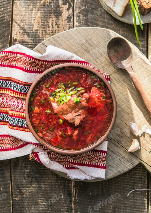 Preview: Borscht - Traditional Ukrainian dish. Vegetable soup in a ceramic bowl. Russian food cuisine