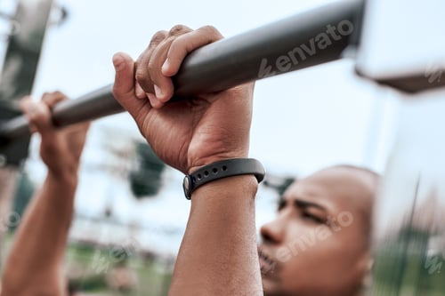 Preview: An african man is exercising at open air gym