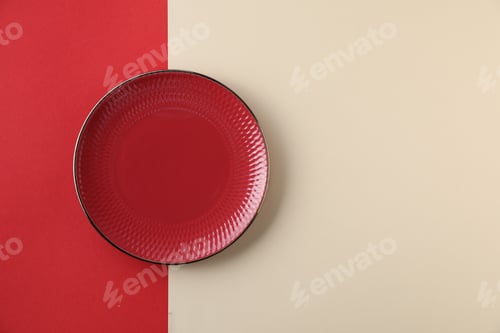 Preview: One empty plate on color background, top view. Space for text