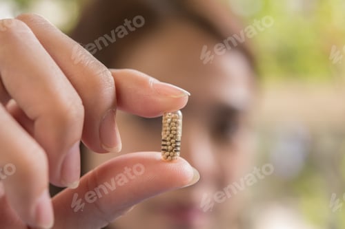 Preview: woman hand holding a pills take medicine according to the doctor's order