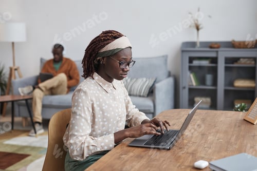 Preview: Young African Woman Working from Home