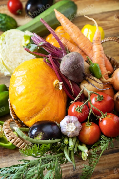 Preview: Big basket with different fresh farm vegetables. Vegetarian. Harvest. Healthy diet concept.