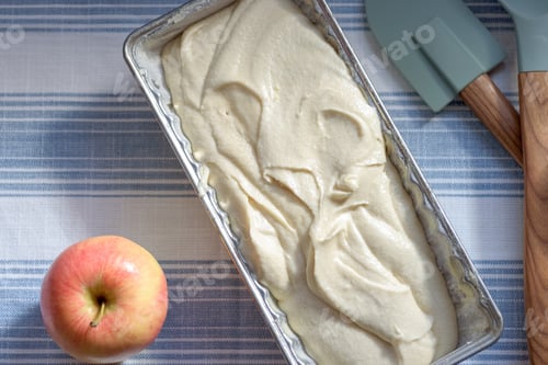 Preview: Textured swirls and peaks of raw cake batter