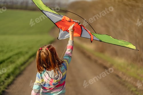 Preview: Lovely little girl flying kite