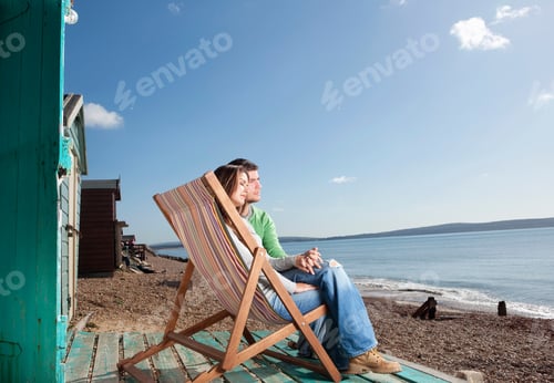 Preview: Couple relaxing by the beach