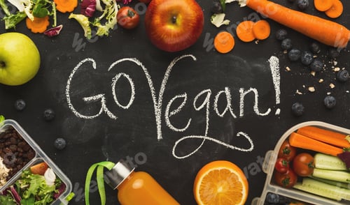 Preview: Lunch boxes filled with healthy food on black board