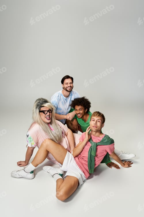 Preview: Vibrant queer friends celebrating pride and friendship in a studio, sharing laughter and joy