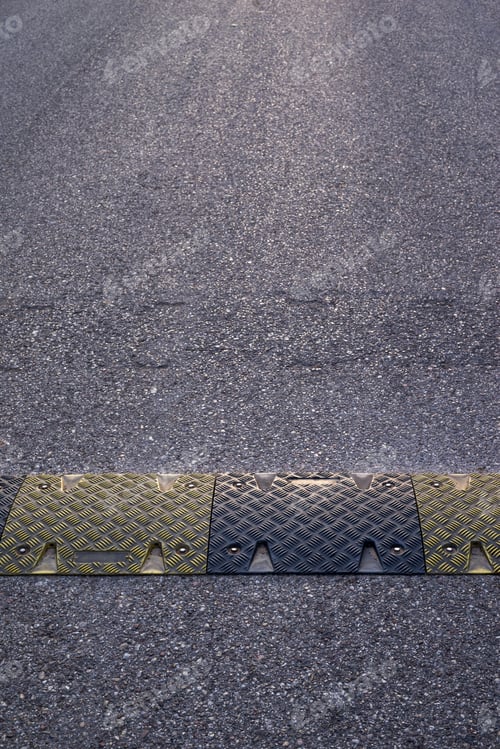 Preview: Background Texture Of The Asphalted Road Or The Highway And A Hump Closeup For Reduction In The