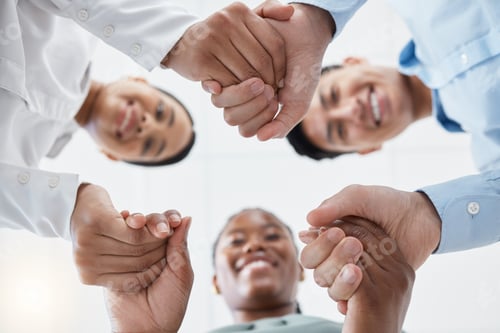 Preview: Diversity, support and collaboration of business people holding hands below in trust for company su