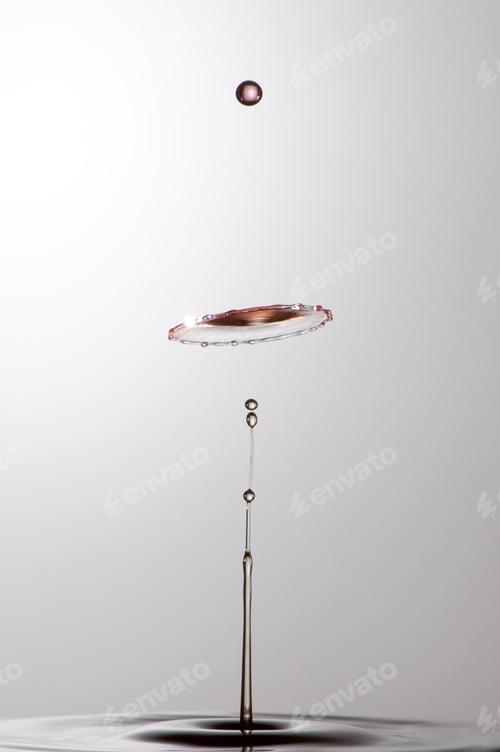 Preview: Splash of colorful liquid with high speed flash
