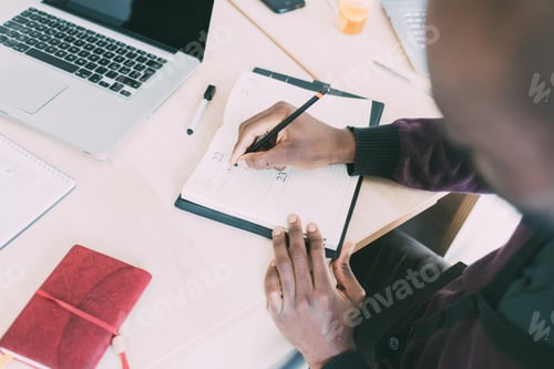 Preview: Young businessman working