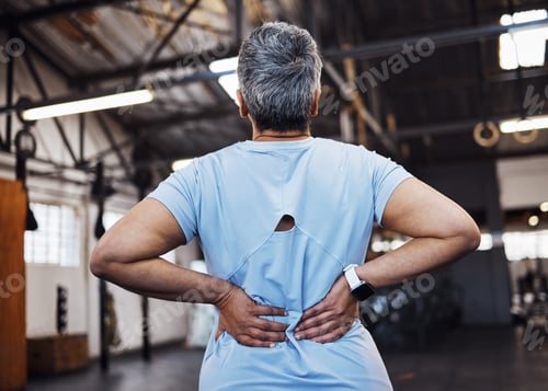 Preview: Back pain, woman and in gym for exercise, fitness and muscle strain with tension, wellness and work