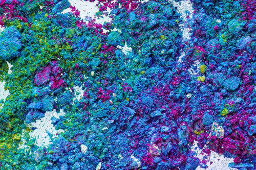 Preview: Make up background of mixed colored smashed eyeshadows