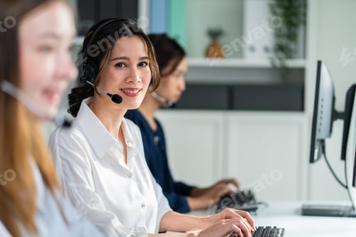 Preview: Portrait of Asian beautiful business woman call center work in office.