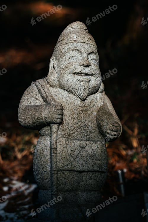 Preview: Small Shinto Explorer Deity statue at Toshogu Shrine Buddhist Temple complex in Nikko Japan.