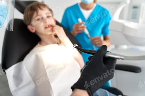 Preview: Child having visit at dentist's office