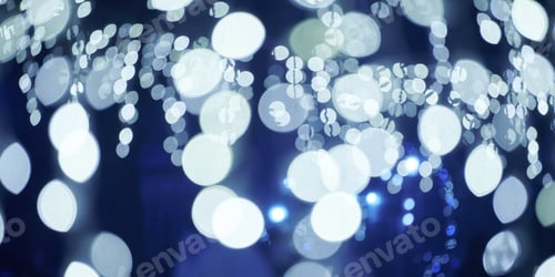 Preview: Blue lights bokeh from christmas holiday garlands, blurred festive background, abstract lights