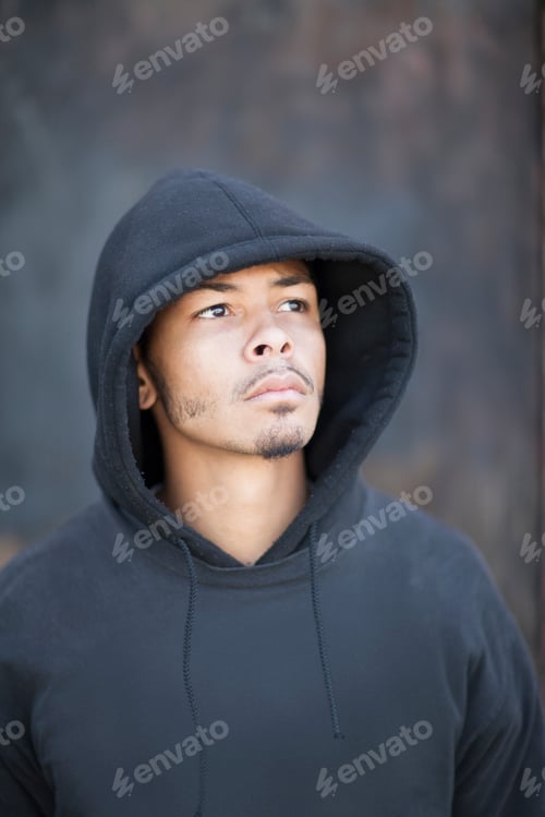 Preview: Portrait of a man wearing a hooded top