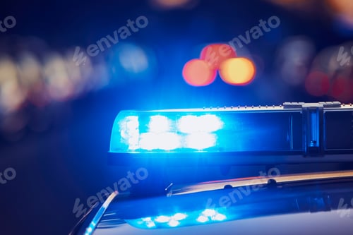 Preview: Siren light on roof of police car at street. Themes crime, emergency and help.