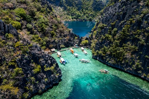 Preview: Aerial view of Twin Lagoon turquoise waters with a drone The Philippines Coron