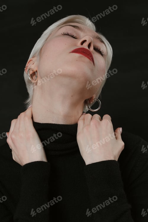 Preview: Beautiful Emotional Girl With White Hair On A Black Background
