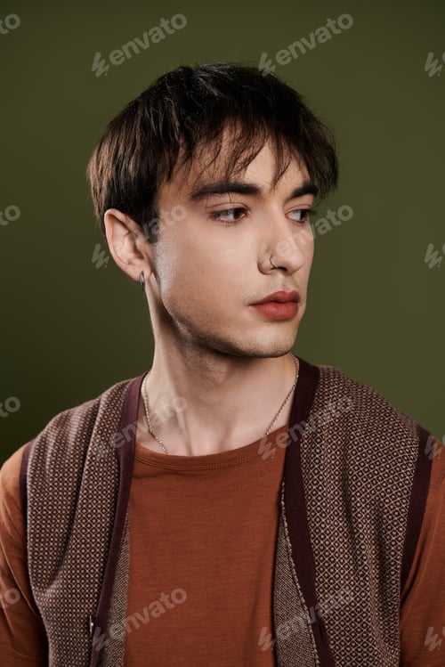 Preview: Elegant Man Posing Against Vibrant Green Backdrop