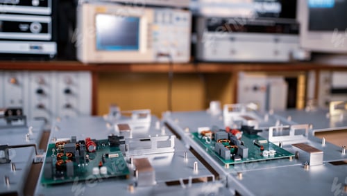Preview: Microcircuits and components lie on metal plates