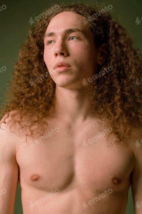 Preview: Attractive And Stylish Guy With Curly Hair And A Sports Figure