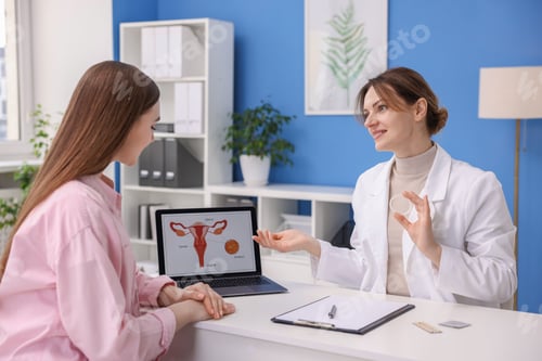Preview: Contraception. Gynecologist recommending vaginal ring to woman in clinic