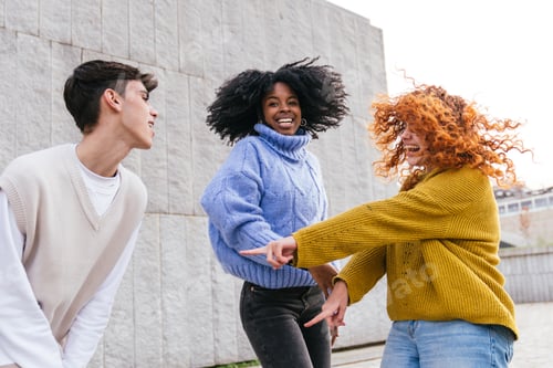 Preview: Multiethnic friends having fun together outdoors