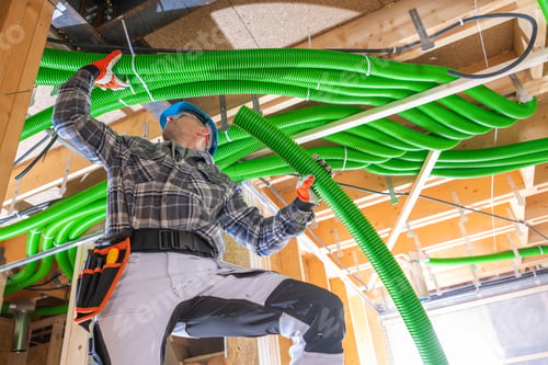 Preview: Construction Worker Installing Air Condition Ducts
