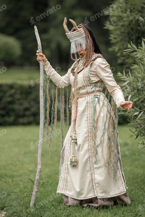 Preview: Beautiful girl in ethnic Karelian costume in nature