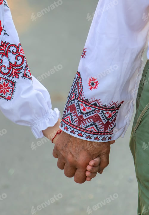 Preview: Ukrainian grandmother and granddaughter in vyshyvanka. selective focus.
