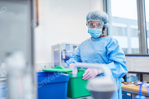 Preview: African Woman Works As A Researcher In The Laboratory With Protective Clothing On Covid-19 Vaccine