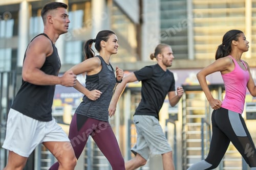 Preview: Happy young multiracial team members during training