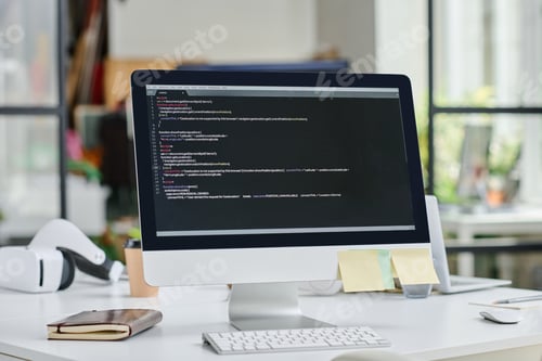 Preview: Computer monitor with codes on table