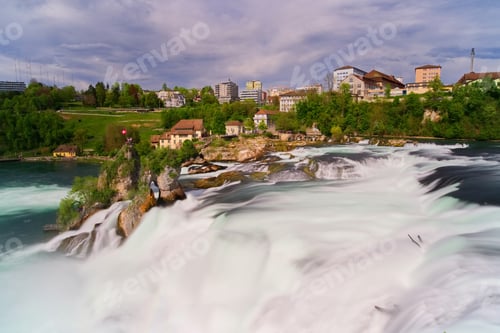Preview: Smooth water flowing at Rheinfall waterfall at Schaffhausen, Switzerland.
