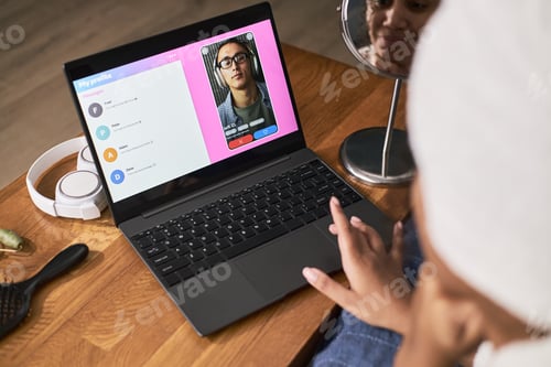 Preview: Young Adult Asian Man Video Chatting with Young Adult Black Woman for Dating