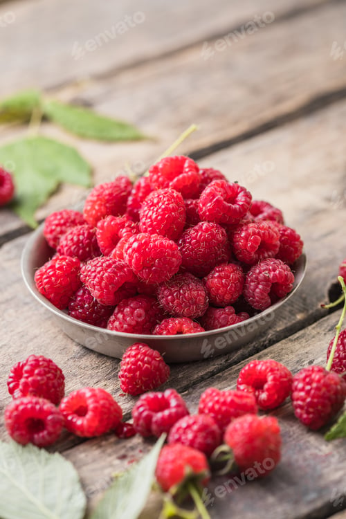 Preview: Fresh and sweet red raspberries. fruit pile background. Macro Photo food raspberry.