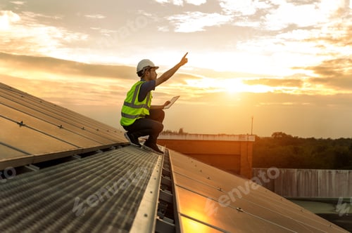 Preview: Engineer working setup Solar panel at the roof top.