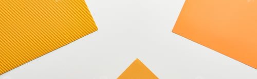 Preview: panoramic shot of bright yellow paper on white background