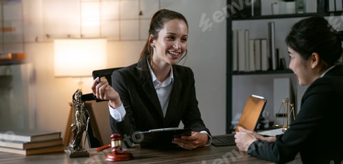 Preview: Consultation female lawyers and professional businesswoman working at law firm in office.