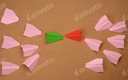 Preview: Two large groups of paper airplanes on a brown background. Conflict of interest