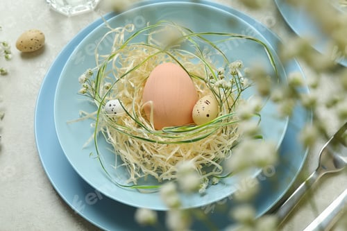 Preview: Happy Easter table setting with eggs on white textured table
