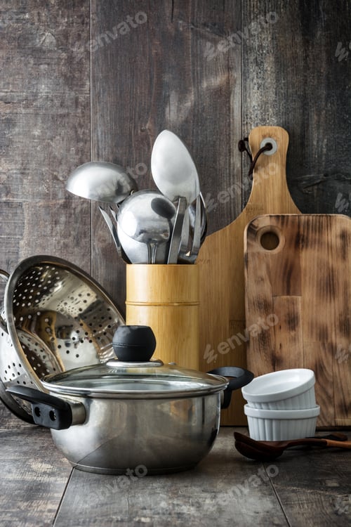 Preview: Kitchen utensils resting on rustic wooden tabletop