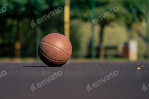 Preview: a sports ground basketball field active recreation the ball lies on the field in front of the