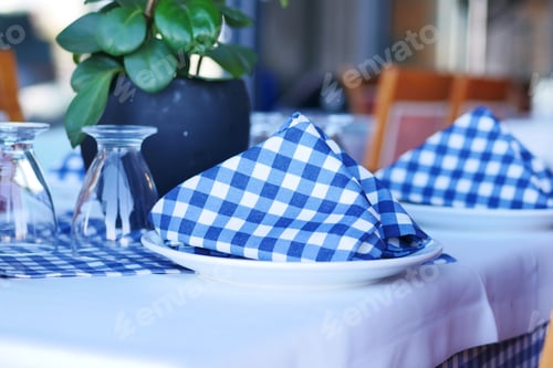 Preview: served and decorated round festive table in a restaurant