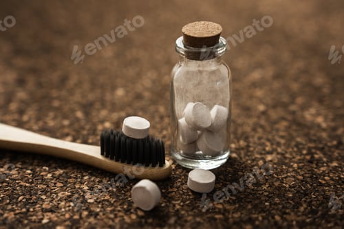Preview: Bamboo Toothbrush and Toothpaste Tablets on Cork Surface
