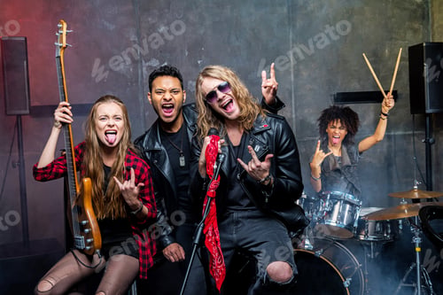 Preview: rock band posing in studio after rehearse