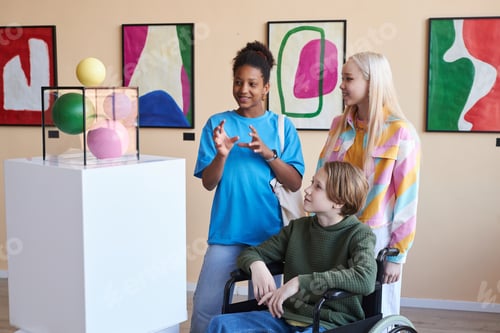 Preview: Friends with teen in wheelchair visiting museum together